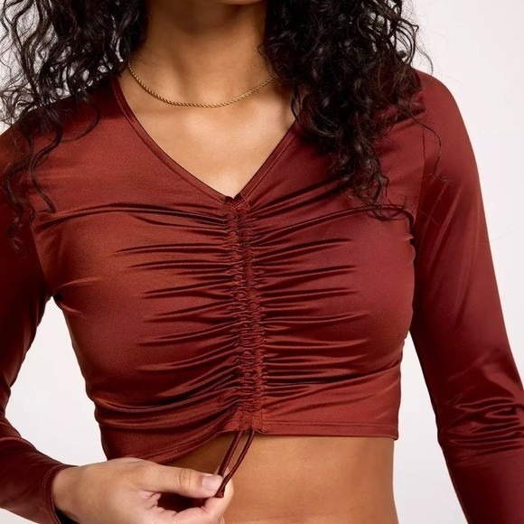 CALIA by Carrie Underwood Other - NWOT CALIA by Carrie Underwood Red Brown Shine Ruched L/S Rash Guard Swim Top M